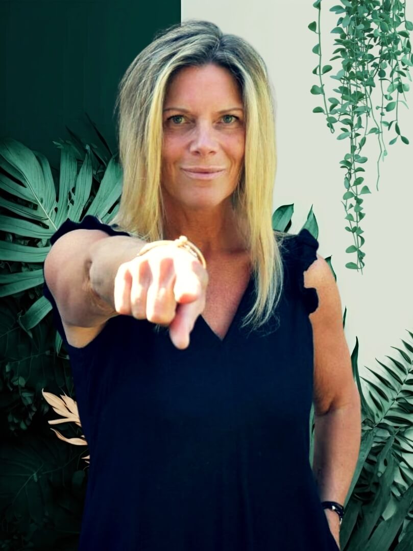 Claire-pointing-with-plants small